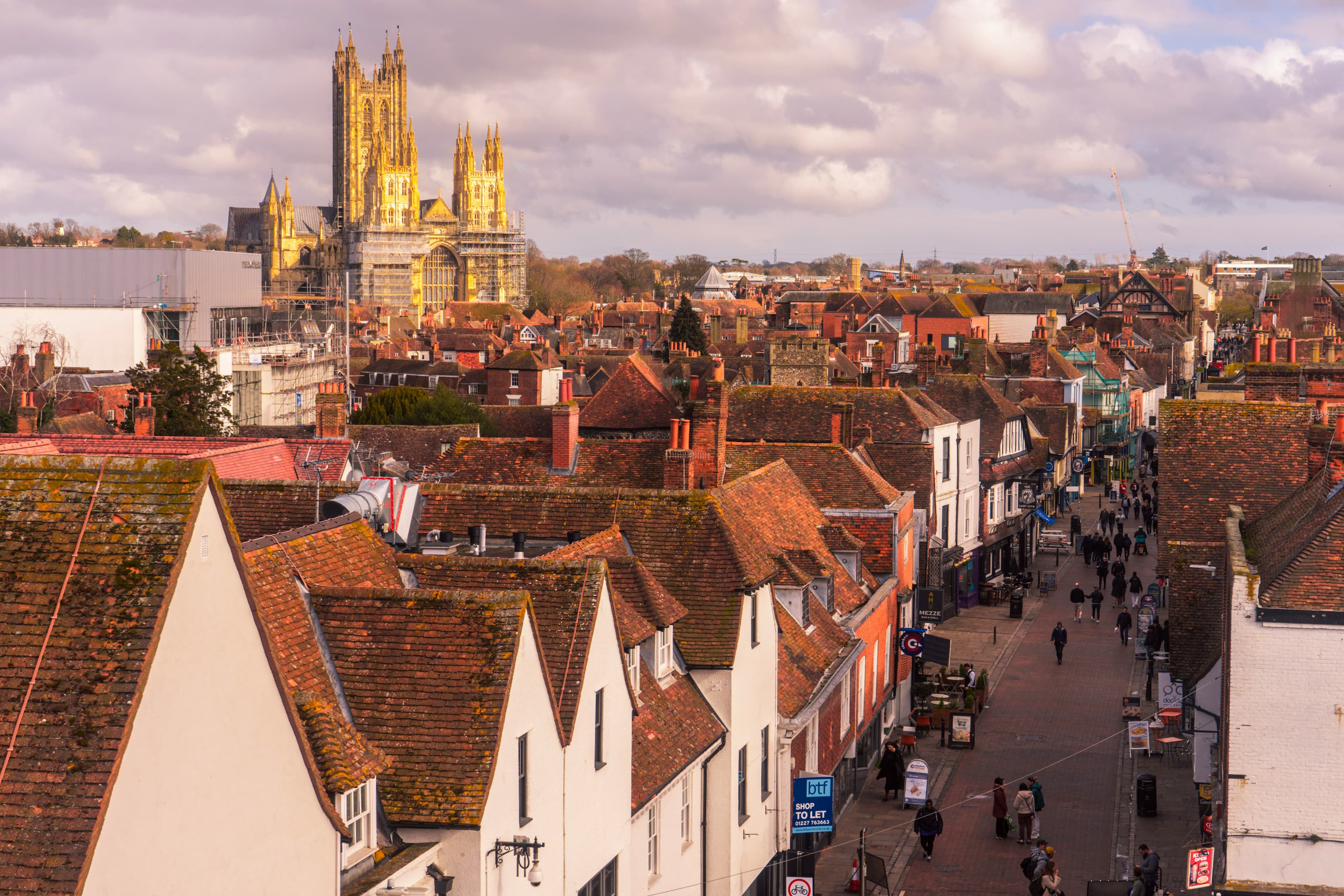 rooftop view of canterbury highstreet with canterbury cathedral and burgate in the distance